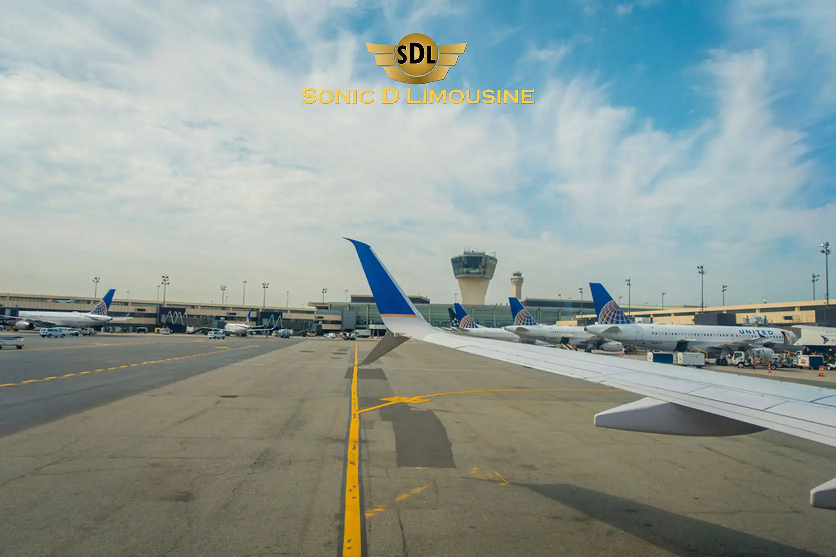 Sonic D Limousine An airplane parked on the tarmac at an airport.