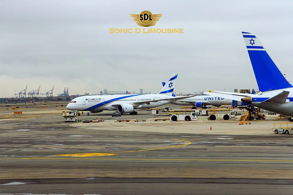 Sonic D Limousine Two airplanes parked on the tarmac at an airport.