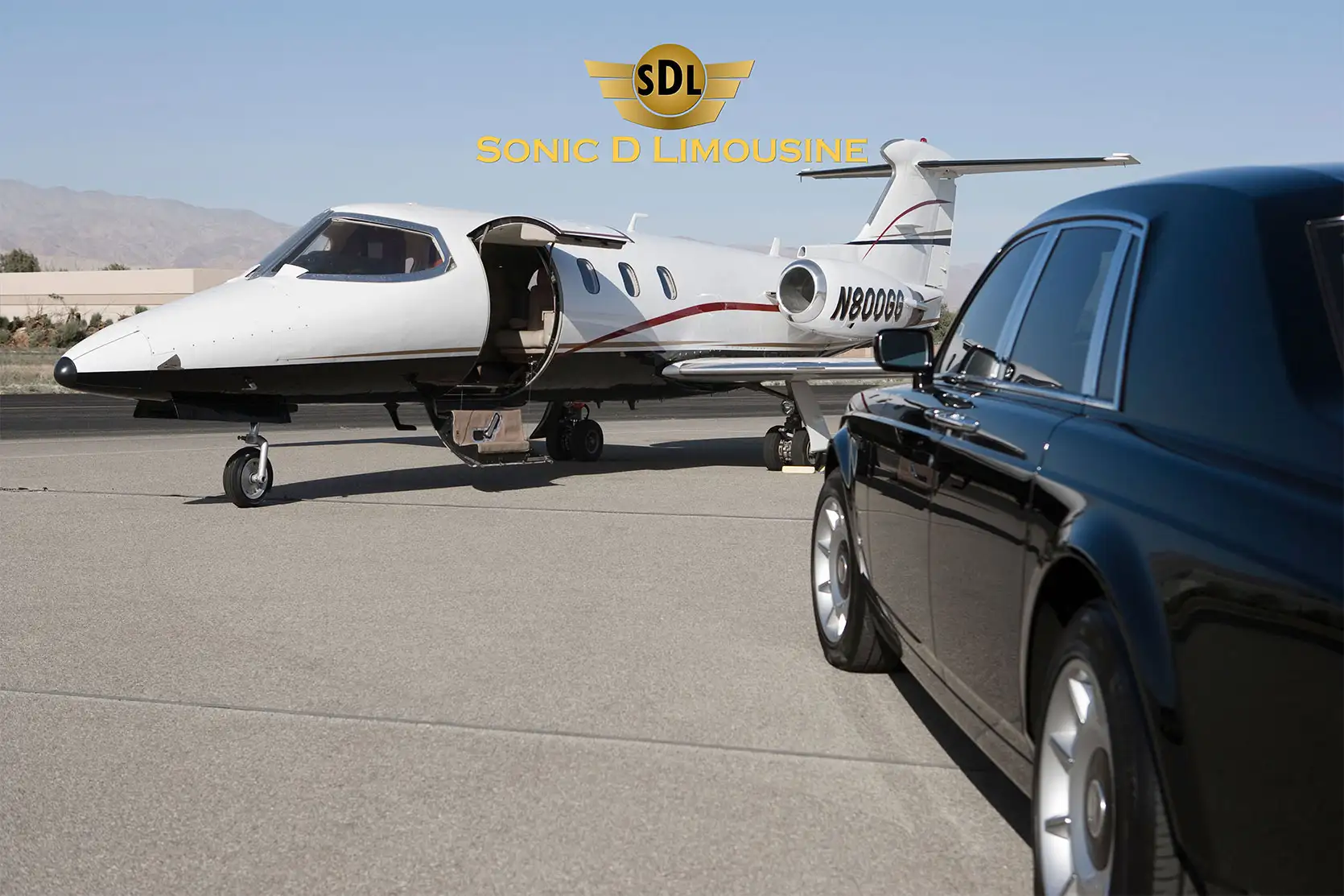 Sonic D Limousine A black limo is parked next to a private jet.